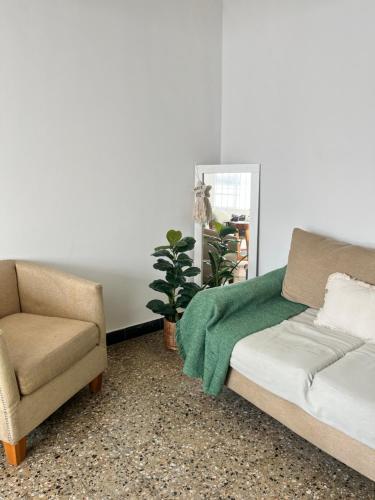 En eller flere senge i et værelse på Departamento a media cuadra de la plaza principal