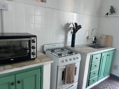 Køkken eller tekøkken på Departamento a media cuadra de la plaza principal