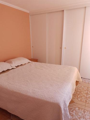 Giường trong phòng chung tại Condominio Palermo