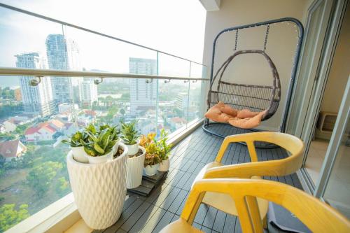 En balkon eller terrasse på The Sóng Vũng Tàu Infinity Pool Apartment - Hồ Bơi Vô Cực - Tháp Tam Thắng