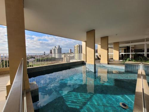 Swimmingpoolen hos eller tæt på Edificio LAVIT - Perto da Getulio com Piscina, Academia e Cowork