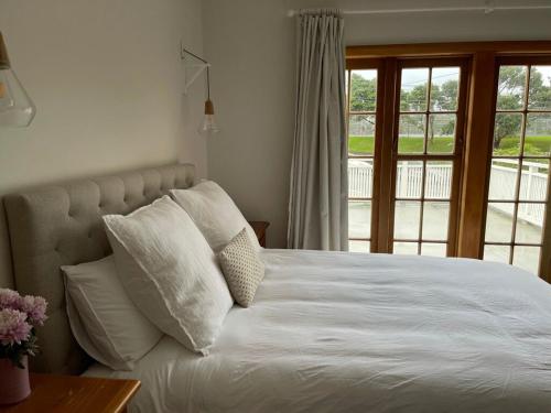 En eller flere senge i et værelse på Maddie's homestay