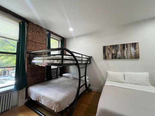 En eller flere senge i et værelse på The Cityline Residences