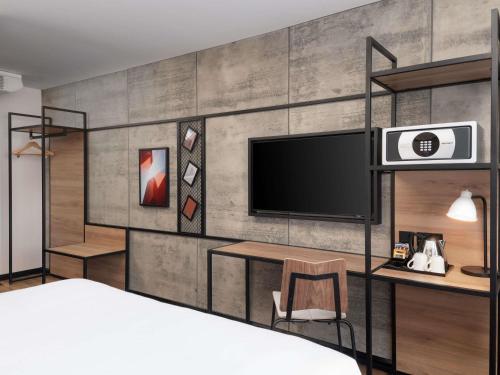 Кровать или кровати в номере ibis London Earls Court