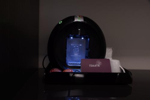 a bottle of water is sitting in a machine at Isaaya Hotel Boutique by WTC in Mexico City