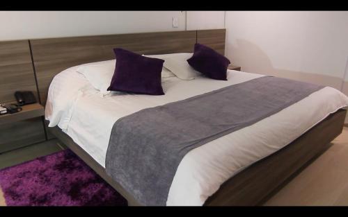 Postel nebo postele na pokoji v ubytování BGA Hotel