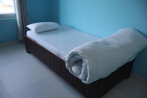 Postel nebo postele na pokoji v ubytování Hotel Sudur