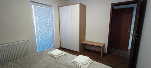 Postel nebo postele na pokoji v ubytování Apartma Mlinca 2