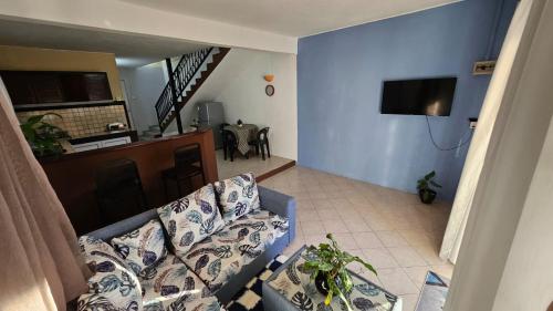 TV a/nebo společenská místnost v ubytování palmiste villa