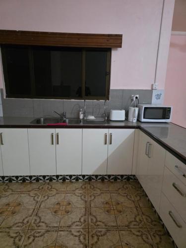 Kuchyň nebo kuchyňský kout v ubytování Abnb House