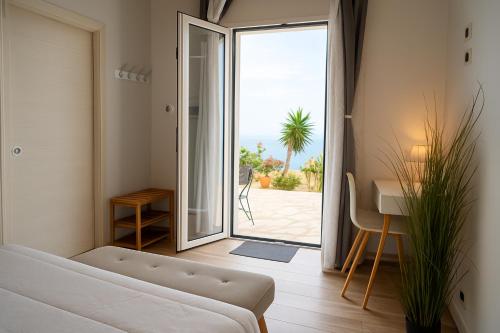 En eller flere senge i et værelse på Hotel Antica Cascina Del Golfo