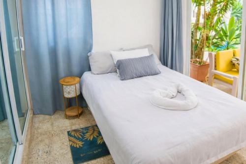 En eller flere senge i et værelse på Harmonia - Sunbeha resort, Juan Dolio