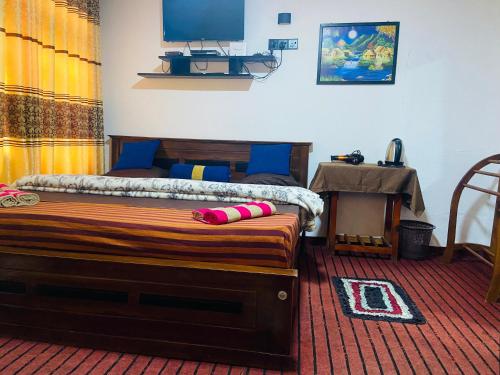 Giường trong phòng chung tại Nine arch eco Villa Ella