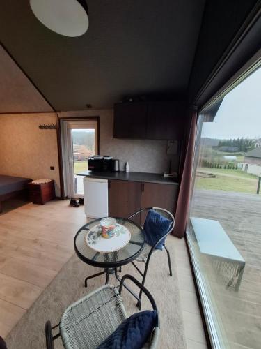 Posezení v ubytování TORA nameliai