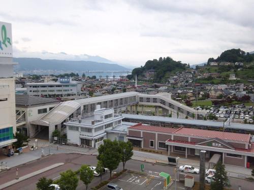 an aerial view of a city with buildings at Okaya Central Hotel in Okaya