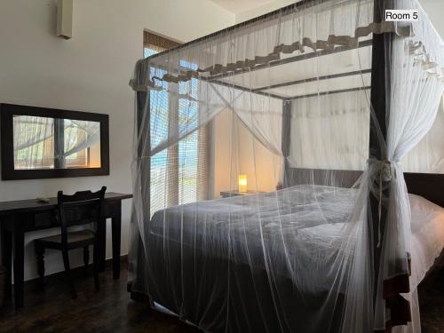 En eller flere senge i et værelse på Silverlane Beach House