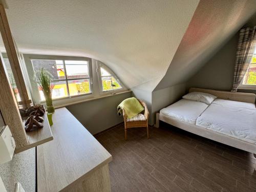 Postel nebo postele na pokoji v ubytování Fischer's Ferienhaus Rügen mit Sauna und Kamin