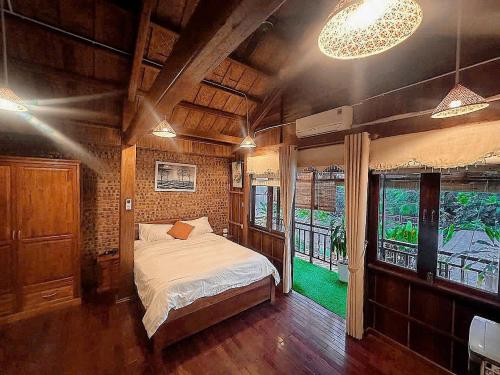 En eller flere senge i et værelse på Family Tan Thanh