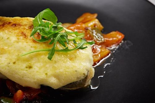 a close up of a piece of food on a plate at Hostal Crisami in Solsona