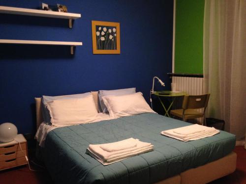 Un ou plusieurs lits dans un hébergement de l'établissement B&B Come A Casa