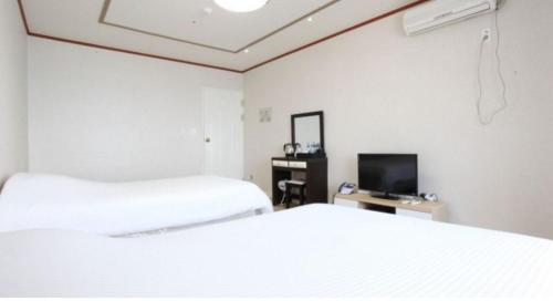 Katil atau katil-katil dalam bilik di The Dodu Hotel