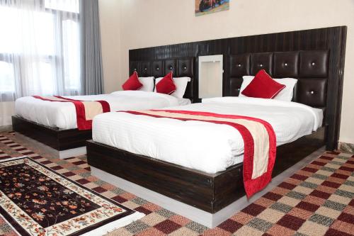 Postel nebo postele na pokoji v ubytování Hotel Opera