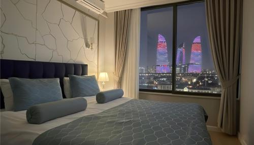 Un pat sau paturi într-o cameră la Senator Boutique Hotel