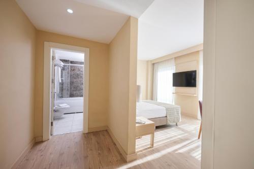 Et badeværelse på Alan Xafira Deluxe Resort & Spa-ULTRA ALL INCLUSIVE