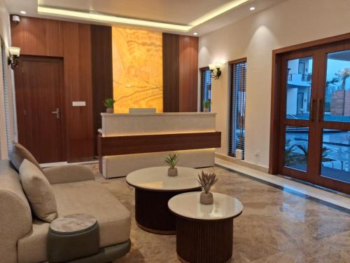 Et opholdsområde på Olive Green Resorts and Villa