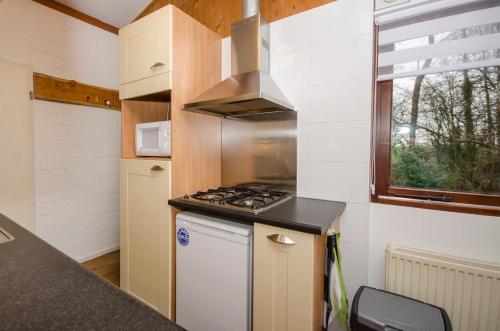 Køkken eller tekøkken på Bungalow including 4 bikes