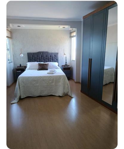 En eller flere senge i et værelse på Casa Por do Sol