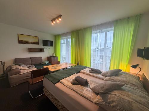 Postel nebo postele na pokoji v ubytování Dom Wczasowy Barbara