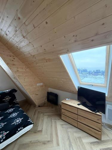 Postel nebo postele na pokoji v ubytování Tatrzański Widok na góry, Jacuzzi, Sauna, parking