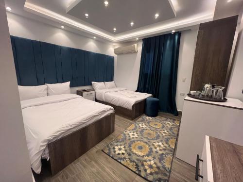 Postel nebo postele na pokoji v ubytování Carlton pyramids view