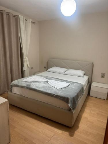 En eller flere senger på et rom på Emmi Appartment