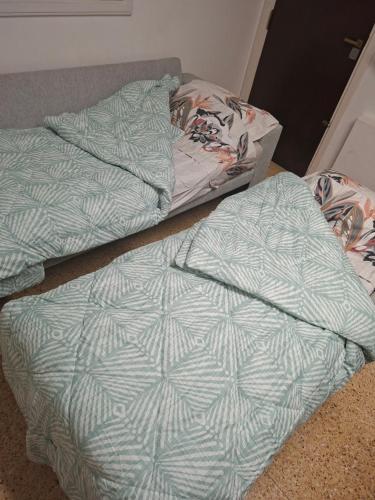 En eller flere senge i et værelse på Los Dias de Viaje