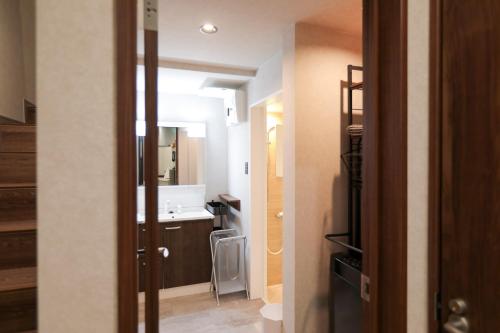 Køkken eller tekøkken på 朱鷺ノ清102