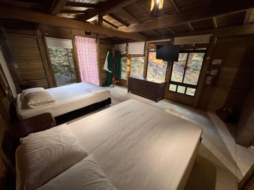 Postel nebo postele na pokoji v ubytování Eco Hotel El Reposo