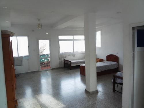 Postel nebo postele na pokoji v ubytování Titus place