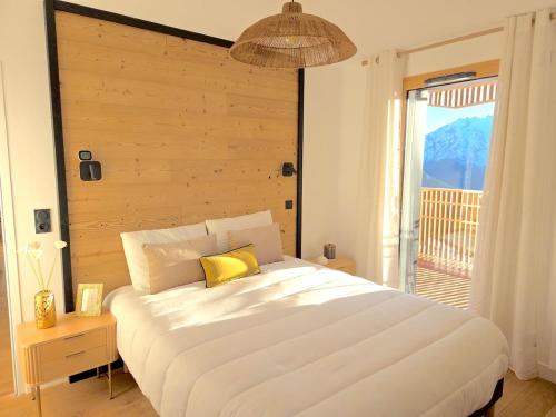 Postel nebo postele na pokoji v ubytování Logement premium neuf & calme - Vue exceptionnelle