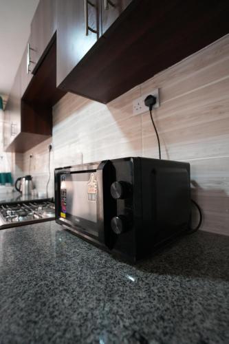 Kuchyň nebo kuchyňský kout v ubytování Peaceful Kisumu Haven