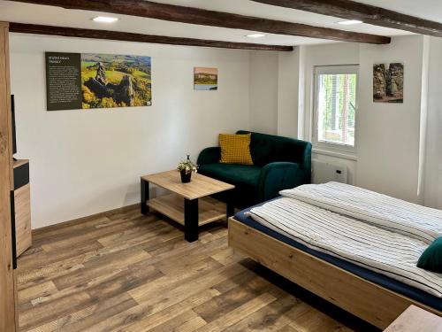 Ένα ή περισσότερα κρεβάτια σε δωμάτιο στο Rekreační dům Dobšín