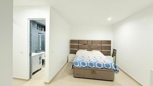 Llit o llits en una habitació de Morabeza Home