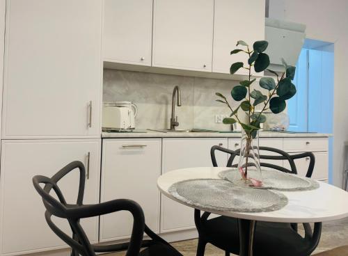 Een keuken of kitchenette bij Pastello & Bianco