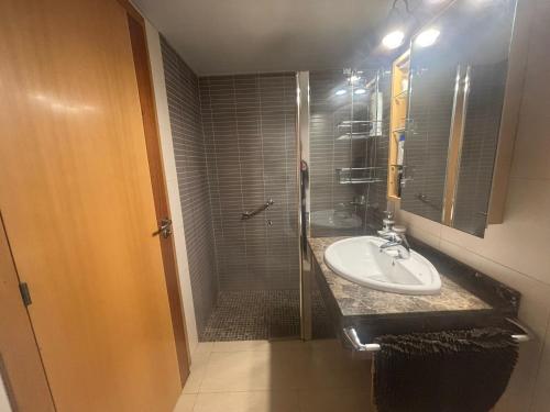 Et badeværelse på Apartamento cerca de la playa