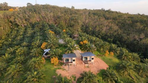 an aerial view of a house on a hill at Por Sampao Camp&Resort in Ban Pha Saeng Lang