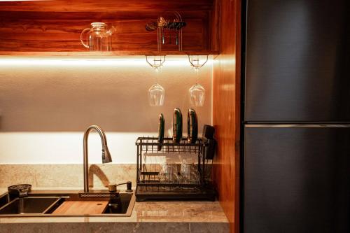 Η κουζίνα ή μικρή κουζίνα στο The Home Villas