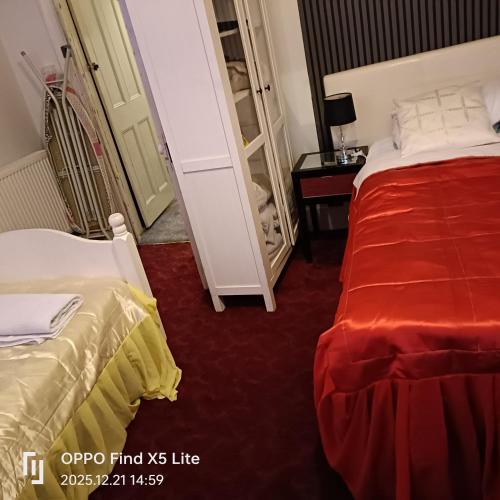 Ένα ή περισσότερα κρεβάτια σε δωμάτιο στο Room2let