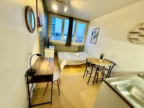 Ένα ή περισσότερα κρεβάτια σε δωμάτιο στο Hyper Centre de Valence - Studio 41