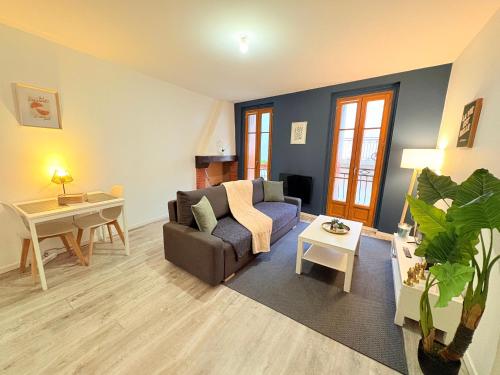 Postel nebo postele na pokoji v ubytování L'Écho du Castella